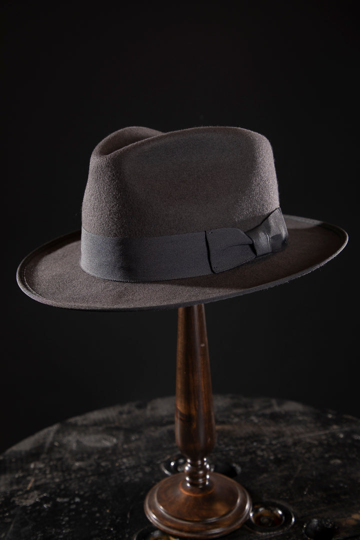 Woolen Fedora Grey - Deluxe, high-quality hats for men and women. Our collection of hats including wool felt top hats, fedoras, bowlers, caps, fedoras, trilbys, cloches and more are a wonderful addition to a 1920s Gangster or Gatsby costume, or the perfect fashion accessory. Shop online, or visit our Mornington hat store to see all that we have to offer.