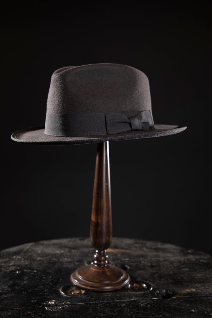 Woolen Fedora Grey - Deluxe, high-quality hats for men and women. Our collection of hats including wool felt top hats, fedoras, bowlers, caps, fedoras, trilbys, cloches and more are a wonderful addition to a 1920s Gangster or Gatsby costume, or the perfect fashion accessory. Shop online, or visit our Mornington hat store to see all that we have to offer.