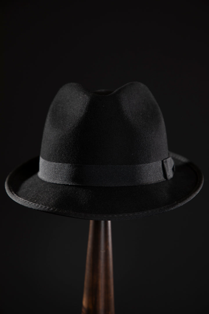 Deluxe, high quality hats for men and women. Our collection of hats including wool felt top hats, fedoras, bowlers, caps, fedoras, trilbys, cloches and more are a wonderful addition to a 1920s Gangster or Gatsby costume, or the perfect fashion accessory. Shop online, or visit our Mornington hat store to see all that we have to offer.