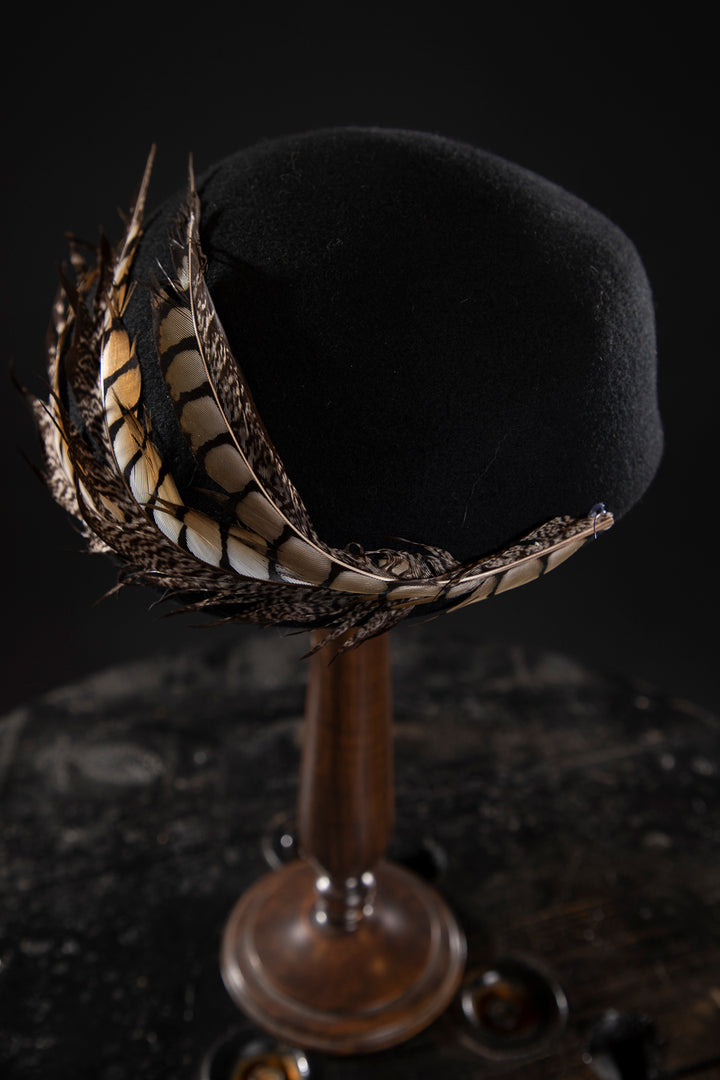 Structured Wool 1920s Beret with Feather -Deluxe, high-quality hats for men and women. Our collection of hats including wool felt top hats, fedoras, bowlers, caps, fedoras, trilbys, cloches and more are a wonderful addition to a 1920s Gangster or Gatsby costume, or the perfect fashion accessory. Shop online, or visit our Mornington hat store to see all that we have to offer.